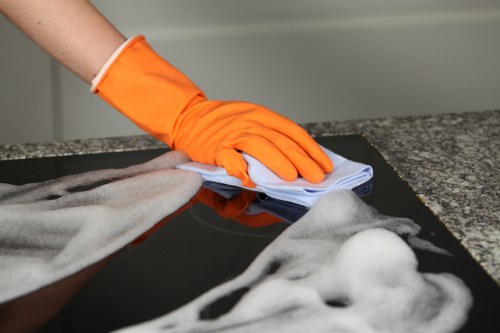 Experienced cleaner refreshing a Roehampton house interior
