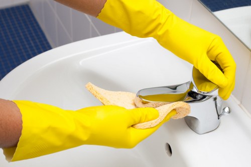 Cleaner preparing a kitchen and living space in Roehampton